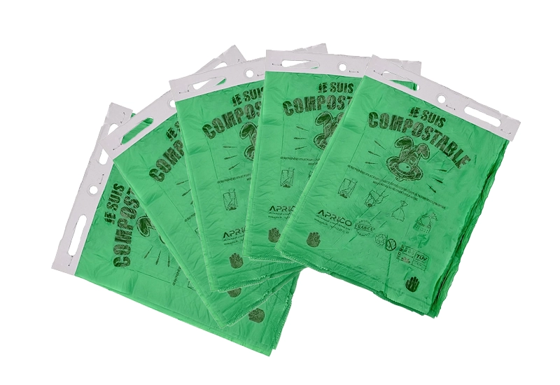 Borse canine compostabili Lacce di sacchetti canini compostabili e personalizzati su uno sfondo bianco.